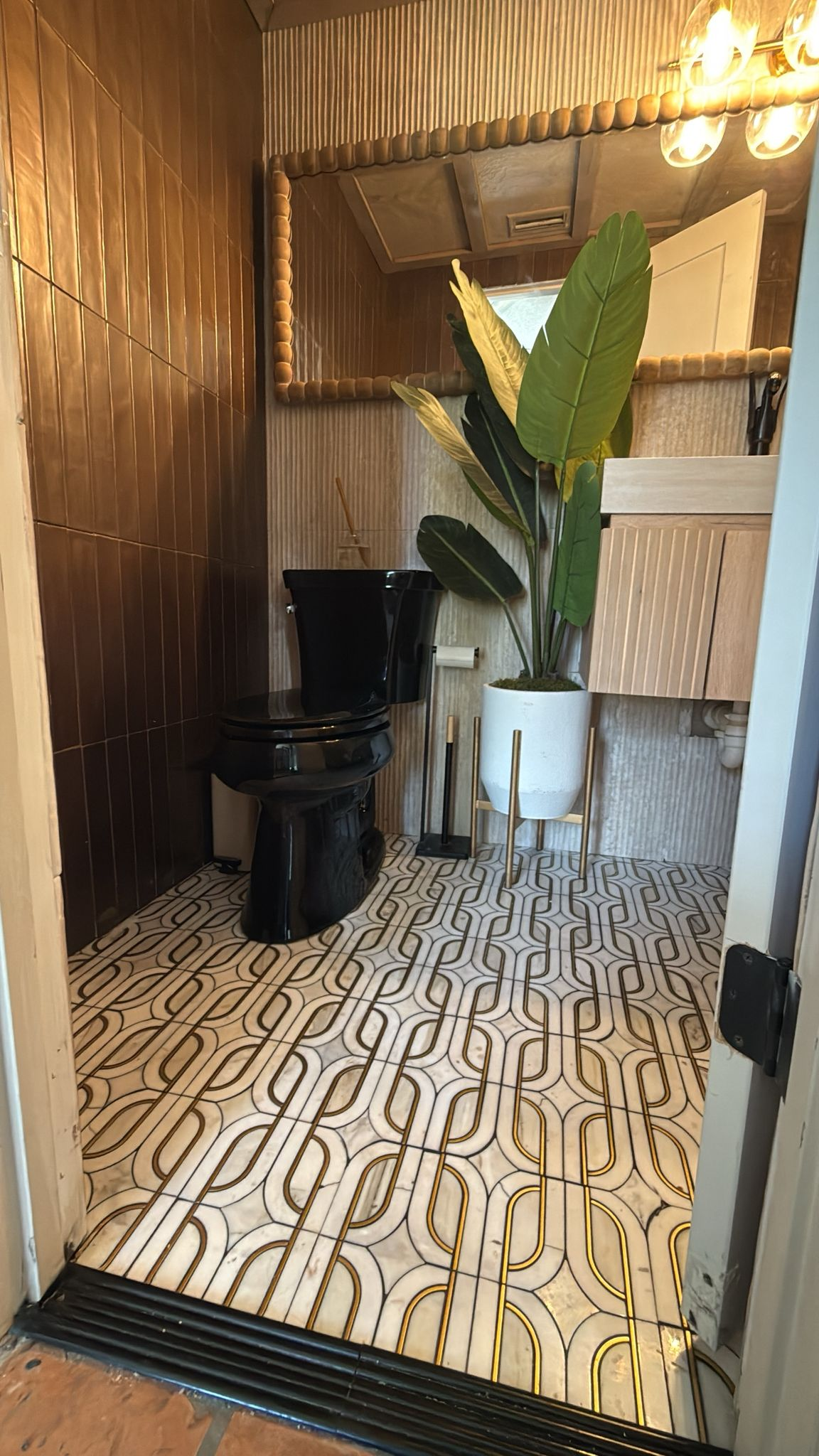 Dramatic geometric art deco marble mosaic tile floor — custom tile installation by Cullinan Tile & Flooring in Sarasota